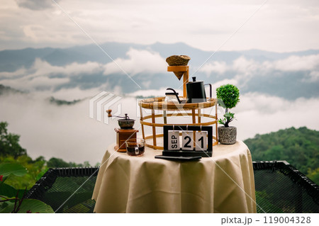 Drip coffee, relax with a view of fog and mountains. Drip coffee, relax with a view of fog and mountains. 119004328