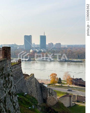 Looking across the Sava river in Belgrade, river boats in the foreground and a variety of office blocks in the distance. Belgrade in autumn season Looking across the Sava river in Belgrade, river boats in the foreground and a variety of office blocks in the distance. Belgrade in autumn season 119006362