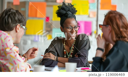 A person with dyslexia brainstorms in a creative workshop, offering unique perspectives and ideas. 119006469