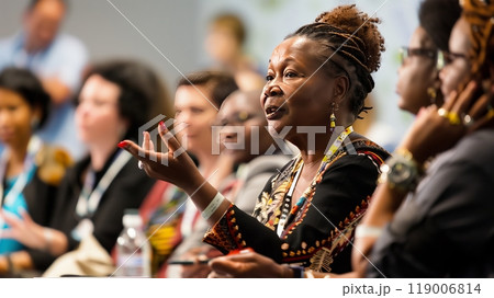A passionate human rights activist speaks at an international conference, emphasizing global equality and justice. 119006814