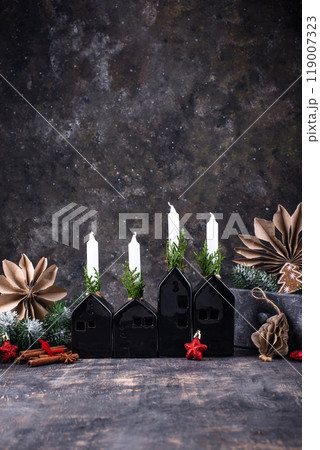 Procass of decorating Christmas advent candles Procass of decorating Christmas advent candles 119007323