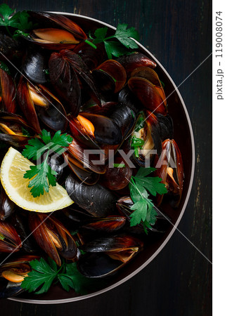 Fresh, Boiled mussels, Black Sea, with parsley and lemon, no people, top view 119008074