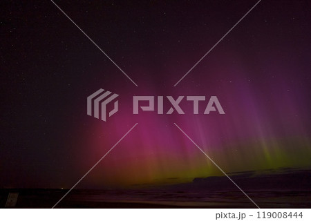 Northern Lights in Central Europe After Strongest Solar Storm in Latvia, Jurmala. 119008444