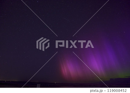 Northern Lights in Central Europe After Strongest Solar Storm in Latvia, Jurmala. 119008452