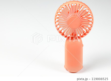 Small white plastic desktop fan front   side view, isolated on white background. 119008525