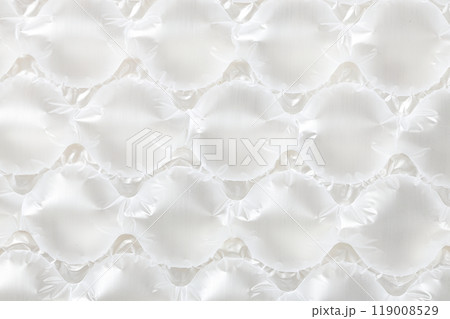 Close up plastic translucent air packaging, Plastic translucent packaging with air cushion. Inflatable air bag isolated on white background. Close up plastic translucent air packaging, Plastic translucent packaging with air cushion. Inflatable air bag isolated on white background. 119008529