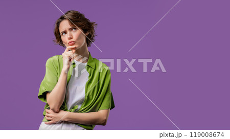 Thinking around stylish woman on violet background. Puzzled lady looking answer. Copy space. 119008674