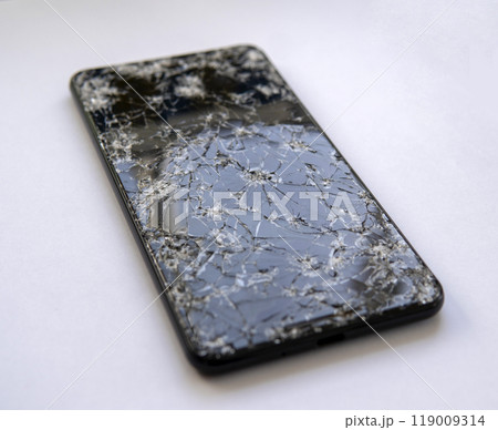 smartphone with broken screen on white background 119009314