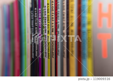 colorful magazines stand in a row colorful magazines stand in a row 119009316