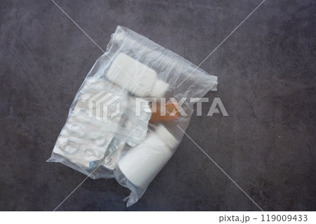 Packaged Medication Items Conveniently Stored in a Plastic Bag for Easy Access and Organization Packaged Medication Items Conveniently Stored in a Plastic Bag for Easy Access and Organization 119009433