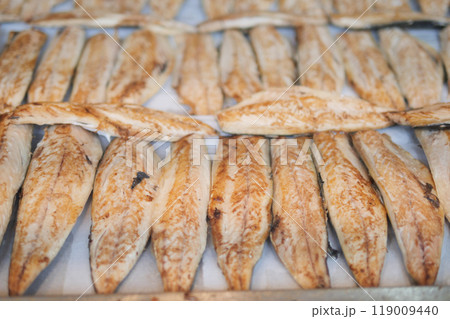 A beautifully presented platter featuring freshly grilled fish as the main attraction A beautifully presented platter featuring freshly grilled fish as the main attraction 119009440