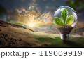 Green leaves in glass bulb on background of nature. Eco-friendly banner for environmental protection. 119009919