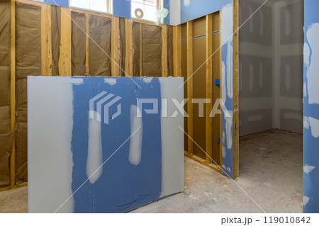 During renovation of house, bathroom is being remodeled During renovation of house, bathroom is being remodeled 119010842