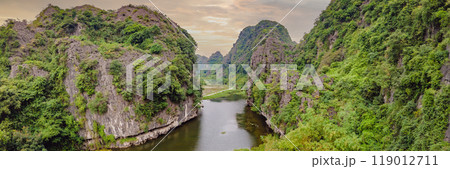 the majestic scenery on Ngo Dong river in Tam Coc Bich Dong view from drone in Ninh Binh province of Viet Nam BANNER, LONG FORMAT 119012711