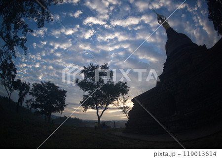 Natural background of silhouette of trees, pagoda and sky view with clouds. Natural background of silhouette of trees, pagoda and sky view with clouds. 119013614