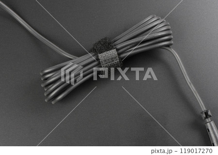 Close-up of black power cable. Close-up of black power cable. 119017270