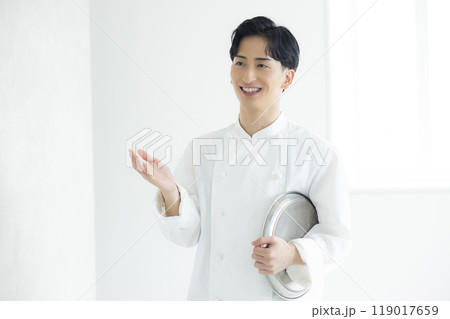 コックコートを着た若い男性　 119017659