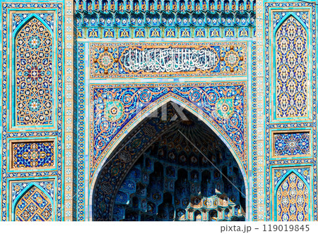 Fragment of a tiled wall with Arabic mosaic of mosque in Saint Petersburg, Russia 119019845
