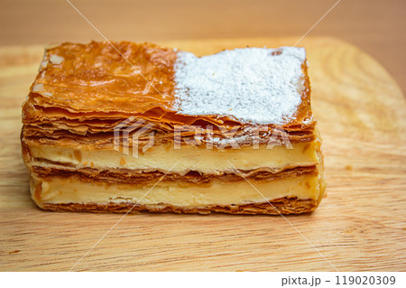 Mille feuille cake layers cream napoleon dessert sweet piece. Mille feuille cake layers cream napoleon dessert sweet piece. 119020309