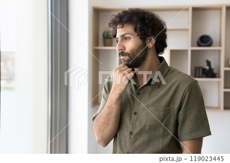 Pensive young businessman of Arabic ethnicity feel lost in thoughts 119023445