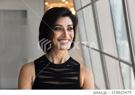 Happy confident young business woman thinking on business success, 119023475