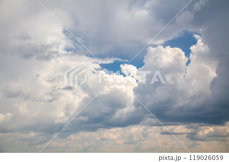 Beautiful Cumulus Clouds with Sunlight Reflections 119026059