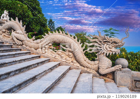 dragon statue decorates the staircase at Linh Ung Pagoda leading to Lady Buddha in Da Nang in Vietnam in Asia 119026189