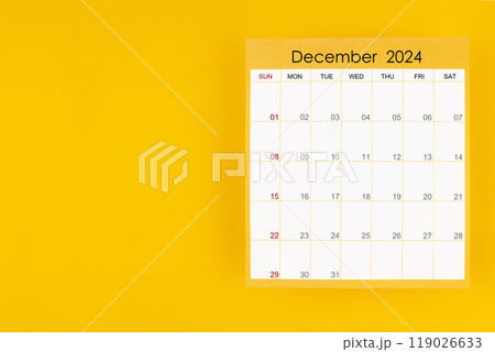 December 2024 caledar page on yellow background, Position with copy space. December 2024 caledar page on yellow background, Position with copy space. 119026633
