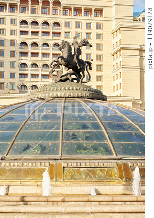 The statue of St. George the Victorious on Manezhnaya Square in Moscow. Urban landscape.      119029128