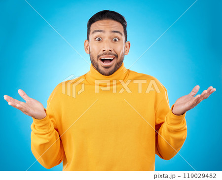 Wow, portrait and asian man in studio with hands for choice, decision or questions on blue background. Palm, scale and face of male customer confused, asking or why emoji for choosing, option or deal 119029482