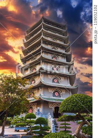 Buddhist tower of Thap Xa Loi Temple at Linh Ung Pagoda in Da Nang in Vietnam in Asia at sunset 119032102