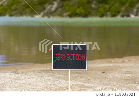 Perfection symbol. Concept word Perfection on beautiful chalk blackboard. Mountain lake. Beautiful mountain lake background. Business perfection concept. Copy space. Perfection symbol. Concept word Perfection on beautiful chalk blackboard. Mountain lake. Beautiful mountain lake background. Business perfection concept. Copy space. 119035021