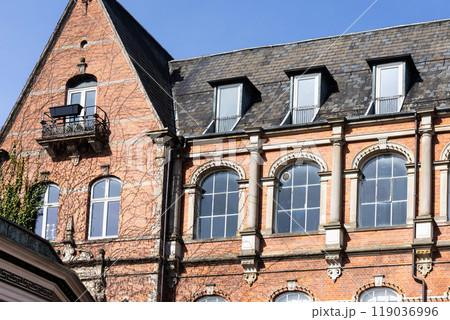 Traditional old red brick house with large windows. Copenhagen, Denmark 119036996