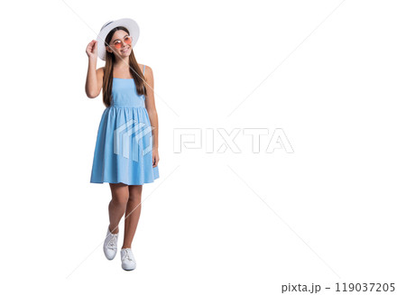 teen girl in summer dress isolated on white, copy space banner. teen girl in summer dress at studio. 119037205