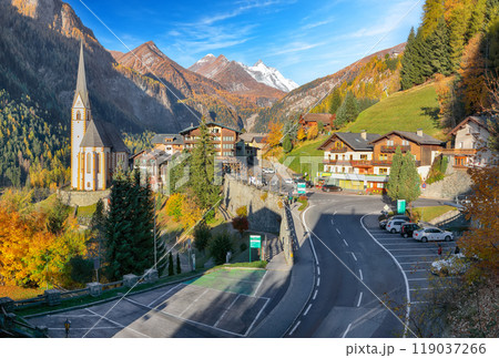 Amazing autumn landscape at Heiligenblut with St Vincent Church near Grossglockner mount . Amazing autumn landscape at Heiligenblut with St Vincent Church near Grossglockner mount . 119037266