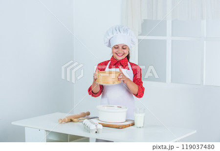 happy child in the kitchen, cooking 119037480
