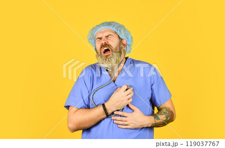 Medicine concept. Health care. listening his heart beating. doctor use phonendoscope. feel heartache. problems with heart. virus attacks people. diseased heart. testing and treatment Medicine concept. Health care. listening his heart beating. doctor use phonendoscope. feel heartache. problems with heart. virus attacks people. diseased heart. testing and treatment 119037767