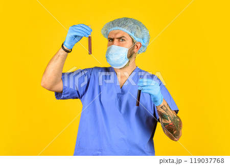 Human to human transmission. New viruses detected all the time. Beginning of virus outbreak. Man doctor uniform yellow background. Type of virus. Coronavirus concept. Expect virus to mutate 119037768