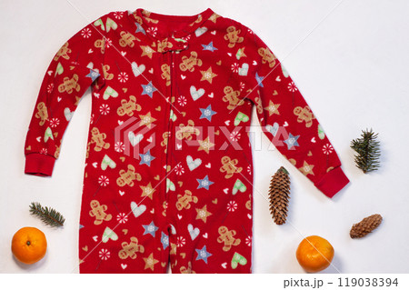 Christmas holidays sweater on white background flatlay. New year events celebration clothes, cute red kids party costume 119038394