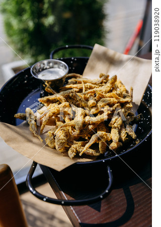 Crispy fried seafood bites served with dipping sauce. Snack for seafood lovers and food enthusiasts 119038920
