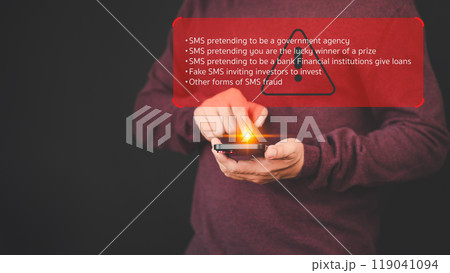 Adult man holding a mobile phone and viewing messages on mobile phone. Fake Text message SMS scam or phishing concept. 119041094