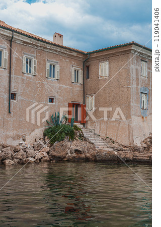 Krk Croatia 26.06.24 Exit from the old poor wall by stairs to the private port 119041406