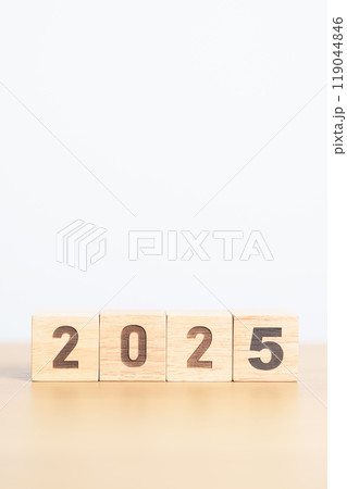 2025 year calendar block on table. goal, Resolution, strategy, plan, start, budget, mission, action, motivation and New Year concepts 119044846