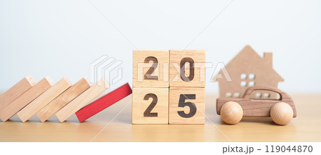 2025 year with wood block falling to business icon with Home and Car model. Real estate Mortgage, House loan and Car debt, Interest rate, risk management, Insurance and economic recession 2025 year with wood block falling to business icon with Home and Car model. Real estate Mortgage, House loan and Car debt, Interest rate, risk management, Insurance and economic recession 119044870