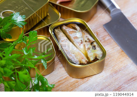 Preserved mackerel fish on wooden table Preserved mackerel fish on wooden table 119044914