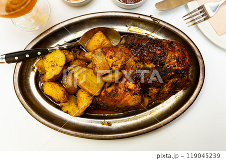 Half of roasted chicken with two sauces 119045239