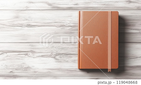 Stylish notebook on a wooden table Stylish notebook on a wooden table 119048668