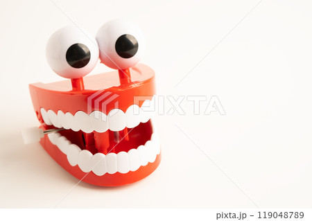 Tooth funny toy denture red color jaw and eye. 119048789