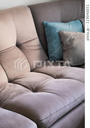 Various cushions placed on couch. Various cushions placed on couch. 119048851
