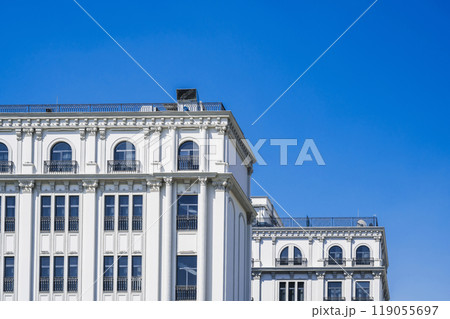 The facade of an ancient classical building 119055697